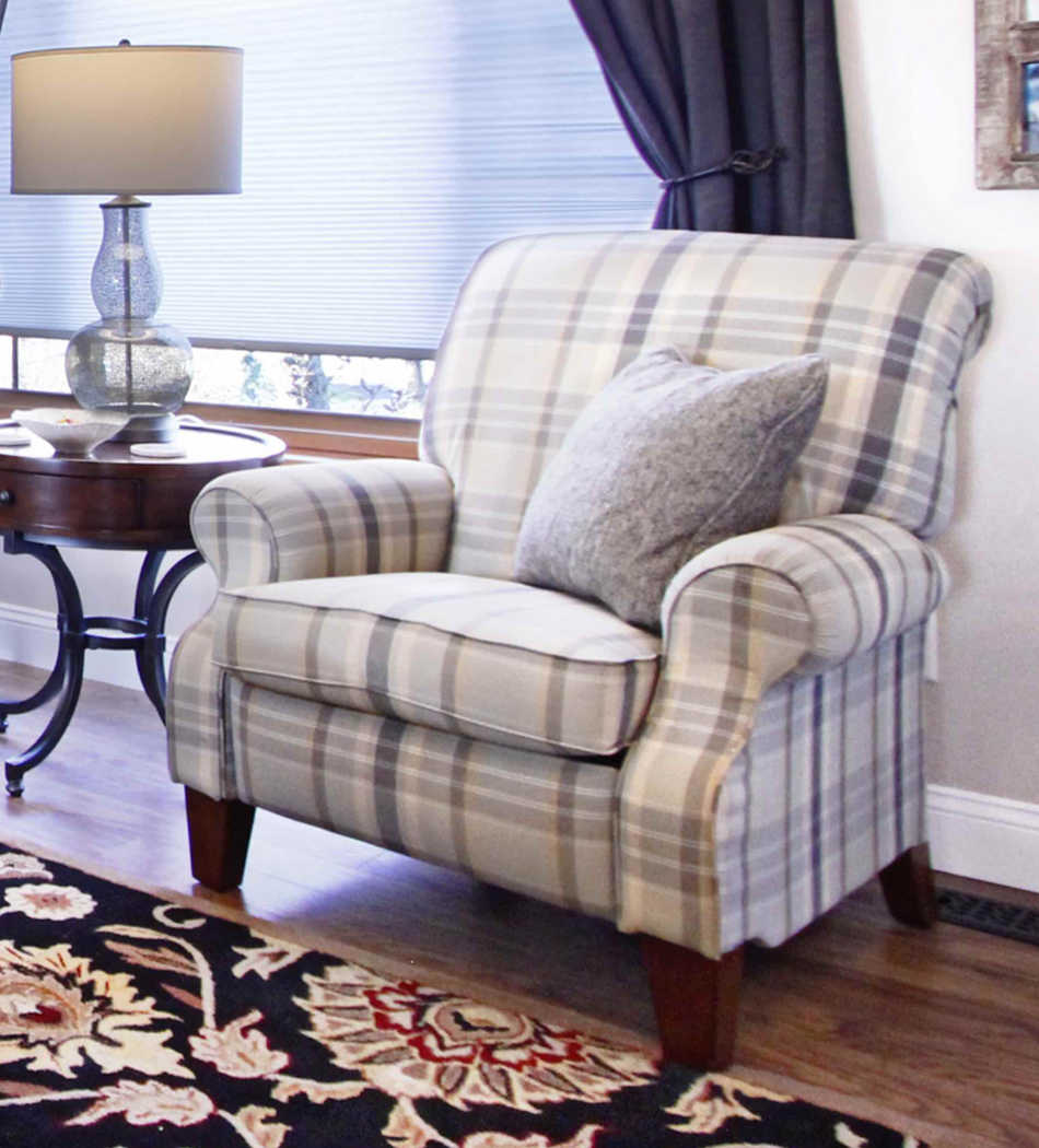 Closeup of chair and accent pieces in the client’s living room