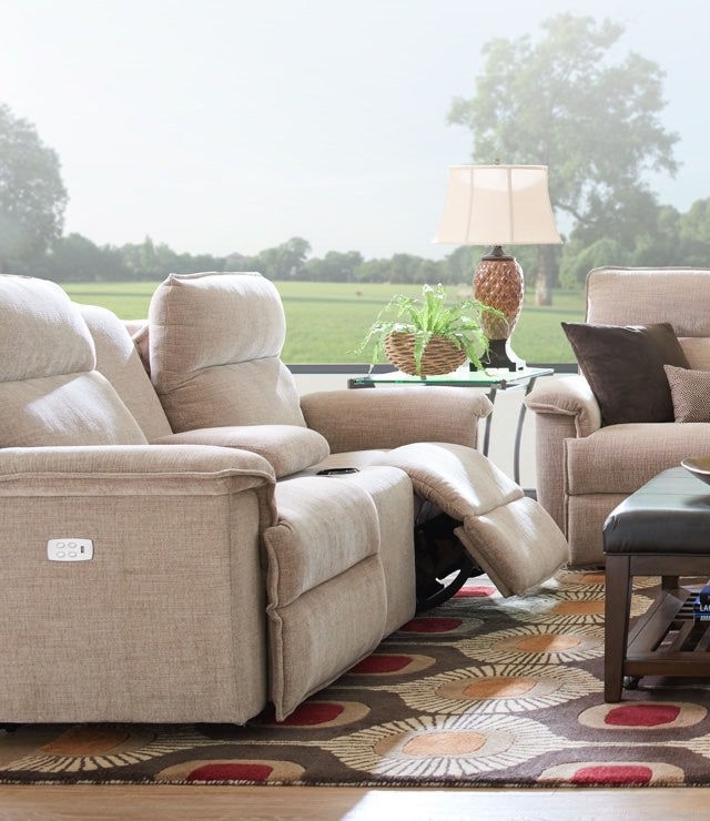 Living room scene with Jay Power Reclining Loveseat w/ Console and Jay Power Reclining Sofa