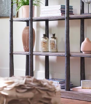 Closeup of wooden shelves with accents