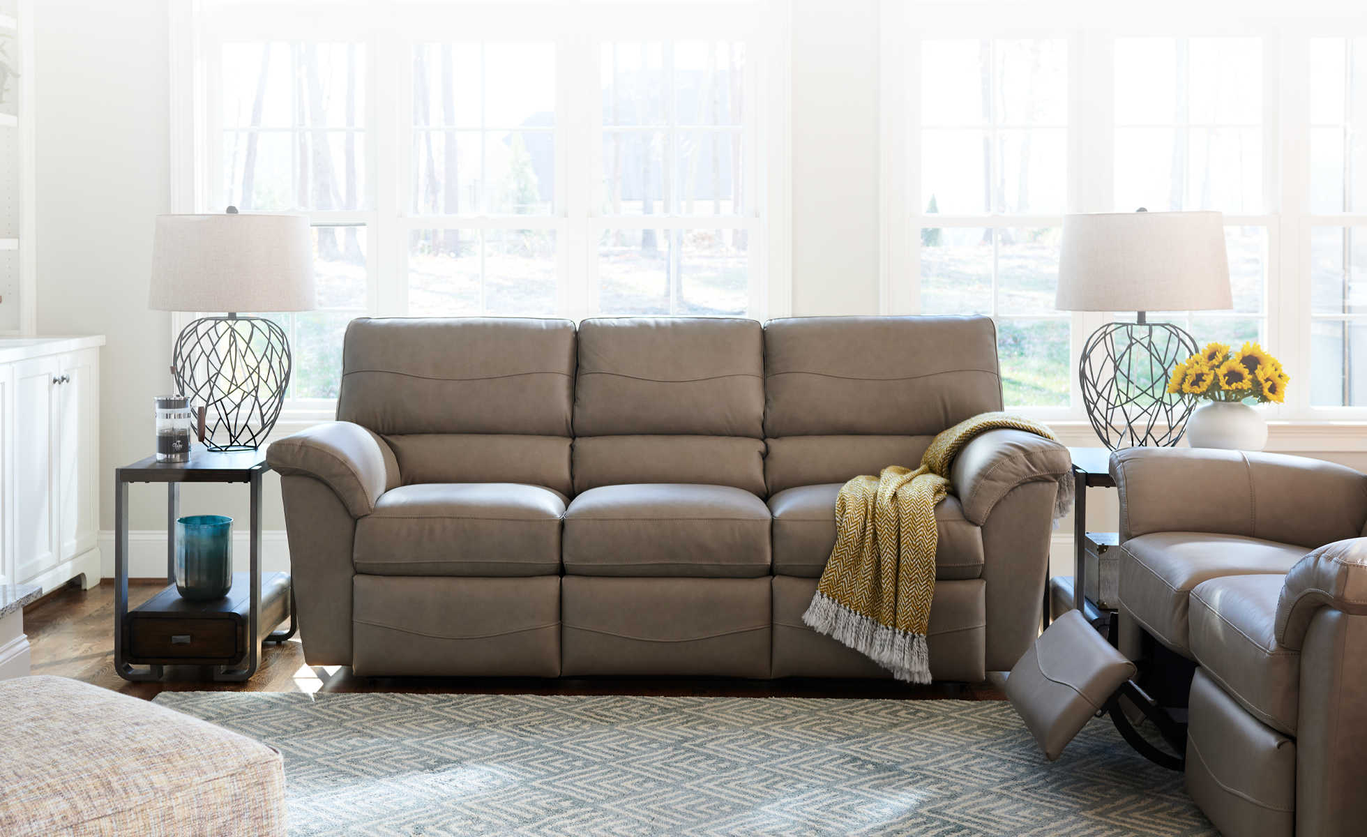 Room scene with leather cover on Reese Reclining Sofa