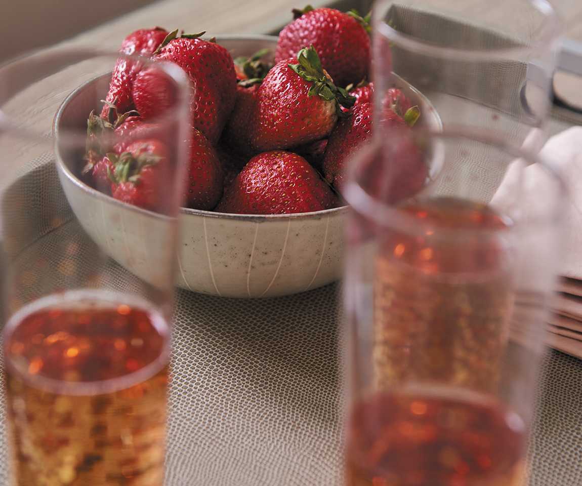 Tray with strawberries and tea