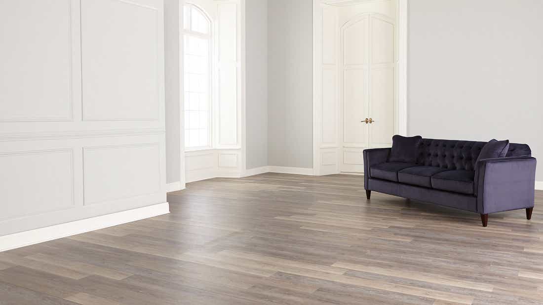 Niña & Cecilia's Design Dash room with just her sofa