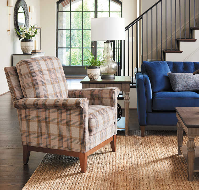 Living room with Chandler High Leg Reclining Chair, Bexley Sofa, and Logan Circle Ottoman