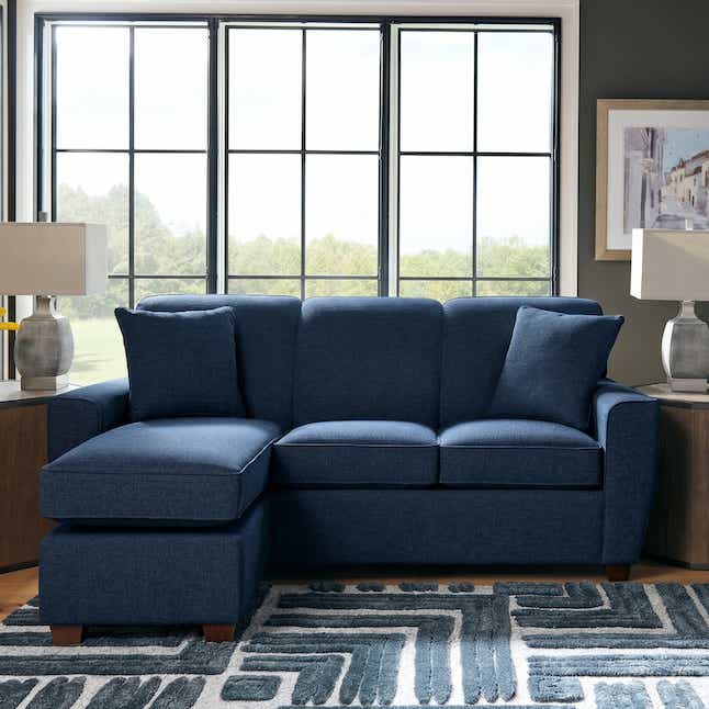 blue fabric 3-seater sofa with chaise