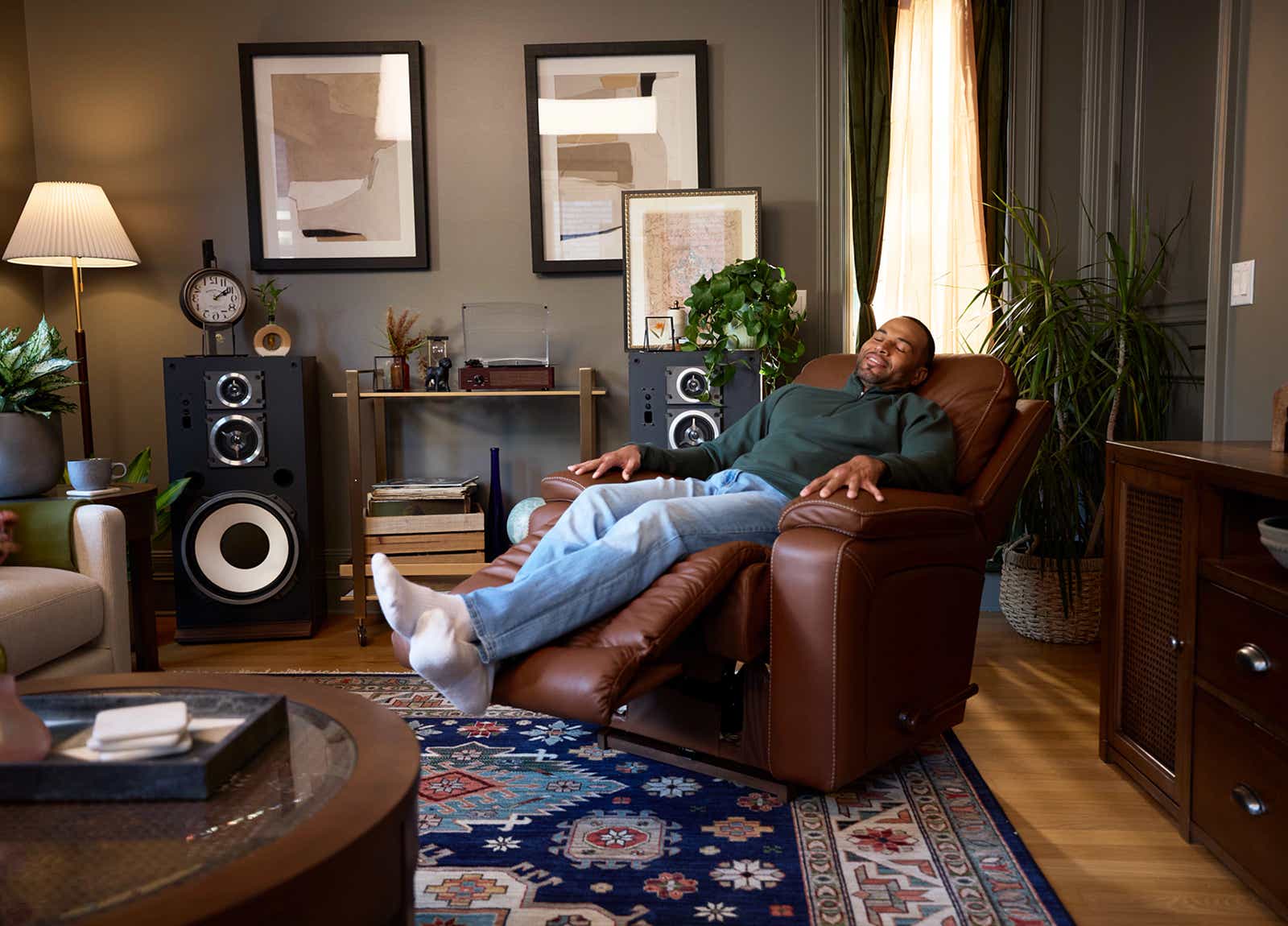 A man relaxing in a La-Z-Boy Recliner